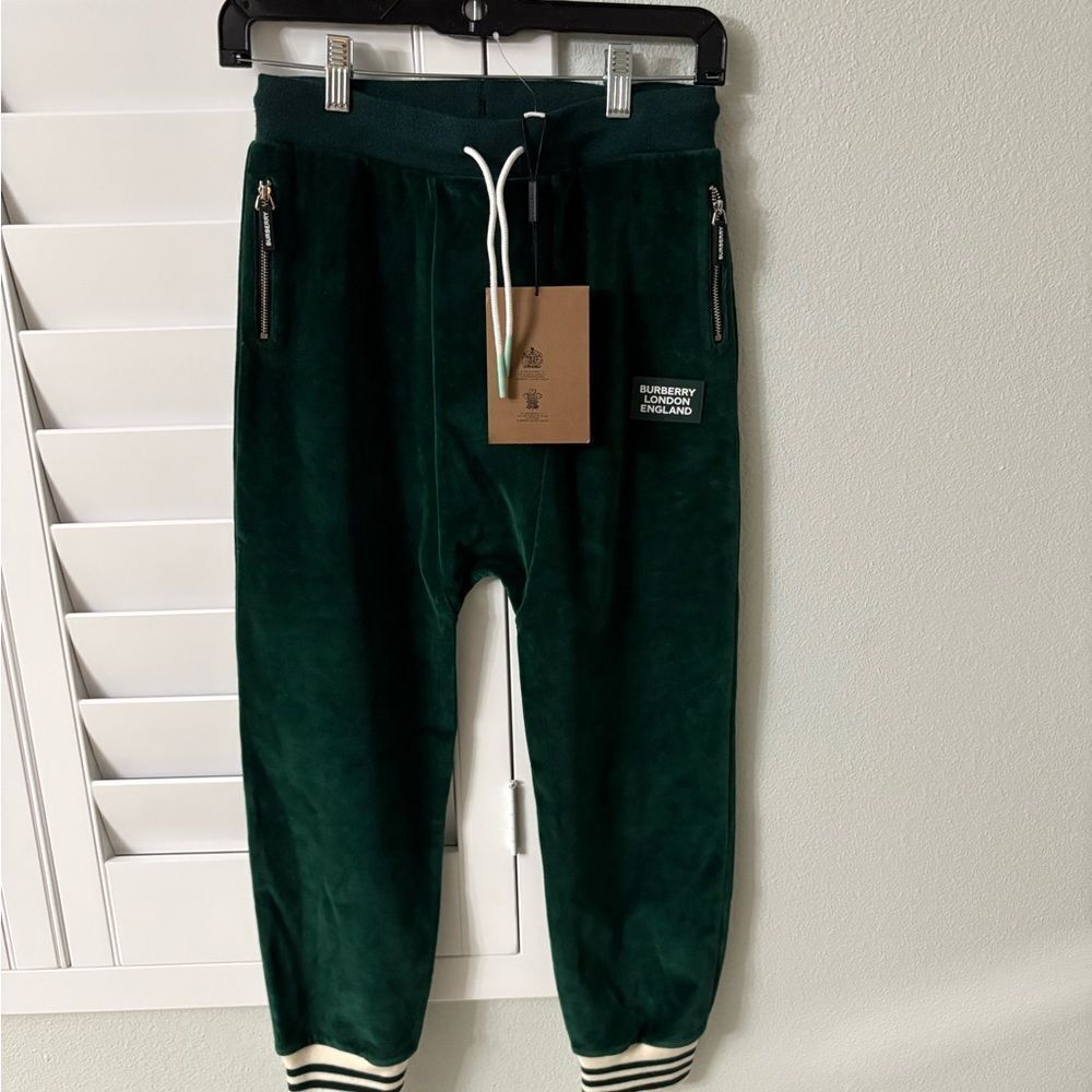 Brand new Burberry Green Jogger Pants with Zipper Pockets fits adults xs and s